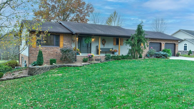 ranch-style house with a porch, a front yard, and a garage