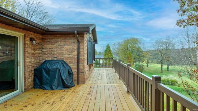 wooden terrace with area for grilling