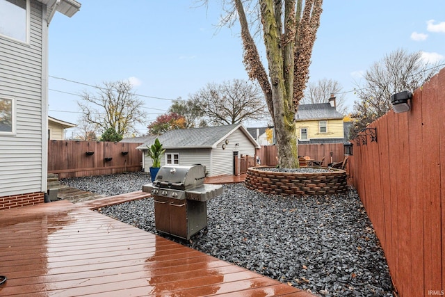 wooden terrace with grilling area