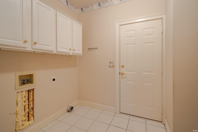 4597 Sierra Dr, Boonville, IN 47601 - laundry room with cabinet space, electric dryer hookup, hookup for a washing machine, baseboards, and light tile patterned floors