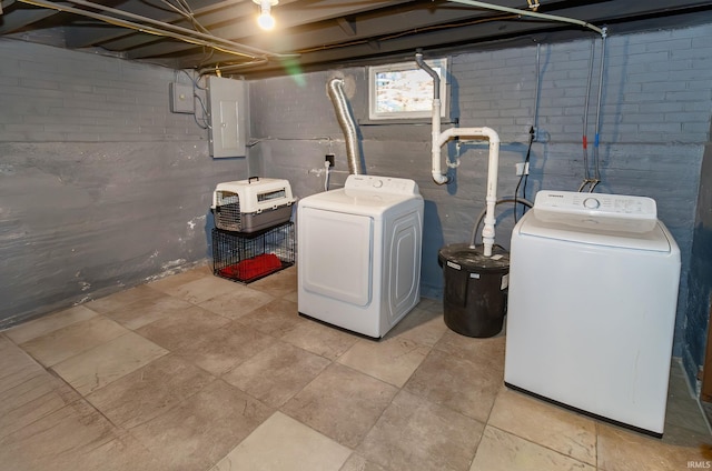 laundry area featuring separate washer and dryer and electric panel