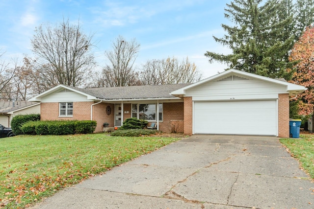 ranch-style home with a garage and a front yard