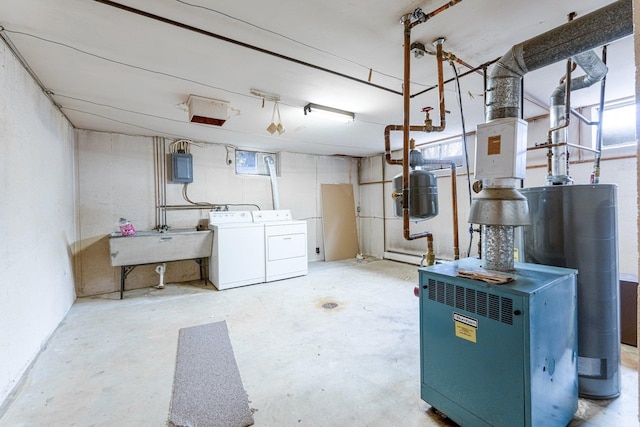 basement with separate washer and dryer, sink, gas water heater, and electric panel