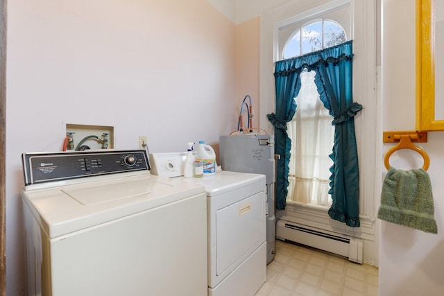 washroom featuring independent washer and dryer, water heater, and a baseboard heating unit