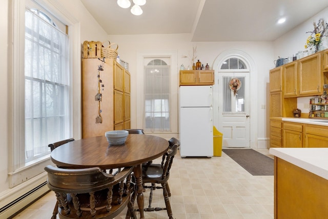 205 W Swager Dr, Fremont, IN 46737 - dining space featuring a baseboard heating unit and light floors