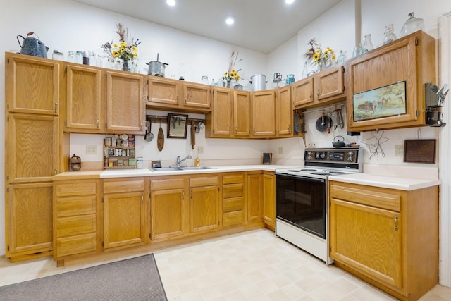 205 W Swager Dr, Fremont, IN 46737 - kitchen featuring electric stove, recessed lighting, and light countertops