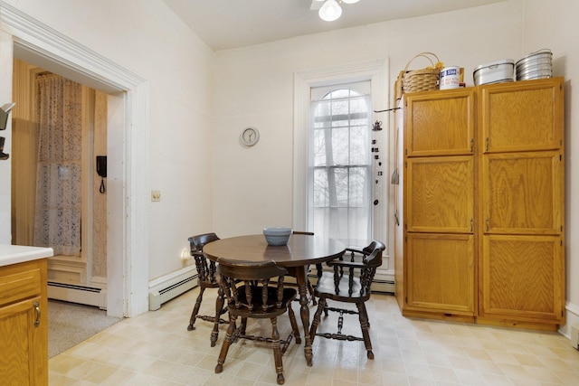 205 W Swager Dr, Fremont, IN 46737 - dining area with baseboard heating and light flooring