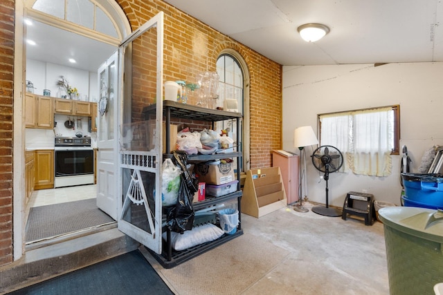 205 W Swager Dr, Fremont, IN 46737 - misc room featuring brick wall and concrete flooring