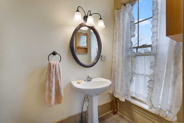 205 W Swager Dr, Fremont, IN 46737 - bathroom with baseboards and wood finished floors