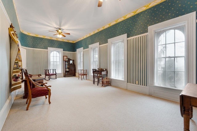 205 W Swager Dr, Fremont, IN 46737 - living area featuring wallpapered walls, ceiling fan, and carpet floors