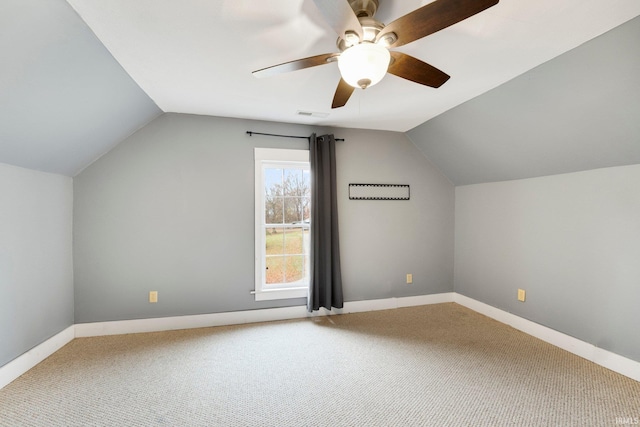 bonus room with ceiling fan, carpet floors, and lofted ceiling