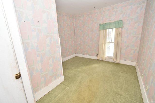 empty room featuring carpet floors