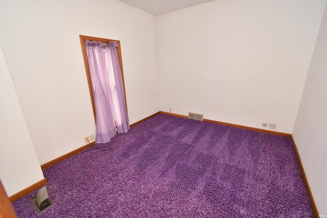 empty room with carpet floors