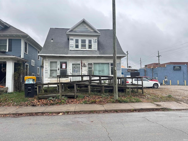 view of front of house with a wooden deck