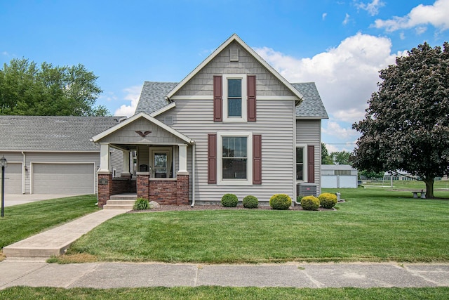 view of front facade featuring a front yard and a garage