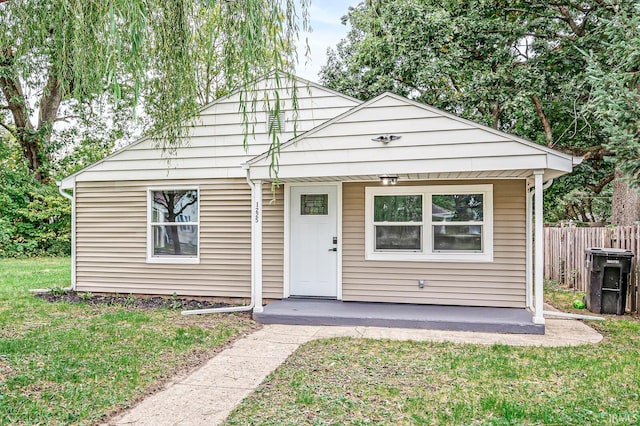 bungalow with a front lawn