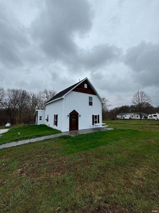 view of property exterior featuring a yard