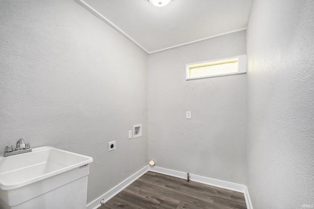 washroom featuring hookup for an electric dryer, washer hookup, dark wood-type flooring, and sink