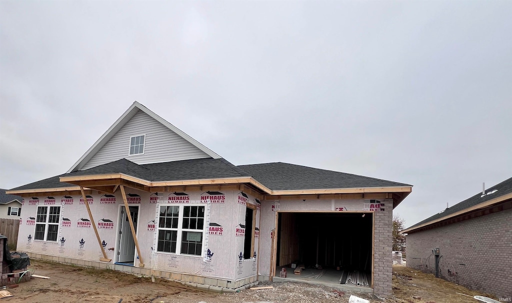 property under construction with a garage