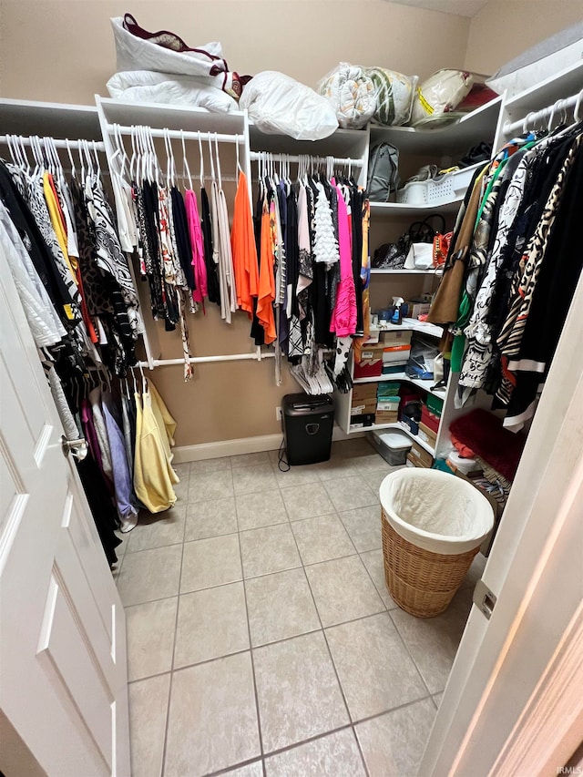 spacious closet with tile patterned flooring