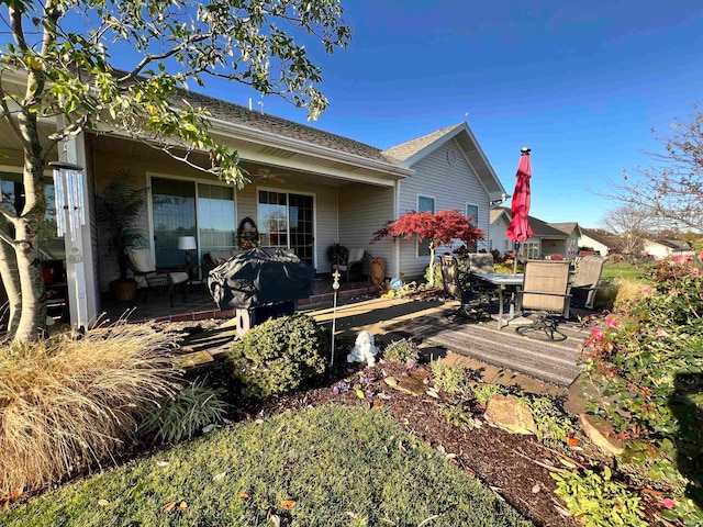 rear view of house with a patio area