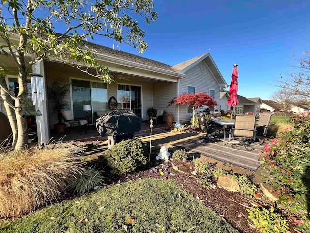 back of house with a patio area