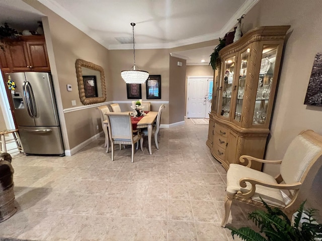 dining area featuring ornamental molding and light tile patterned floors