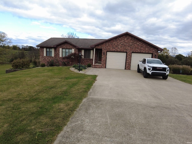 view of front of house featuring a garage and a front lawn