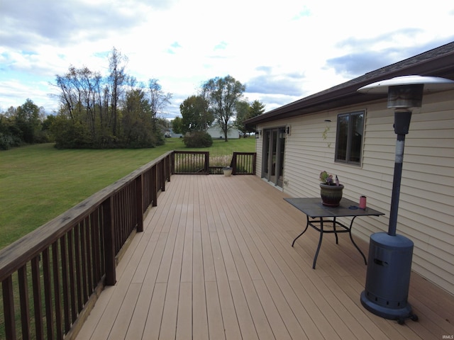 wooden deck with a yard