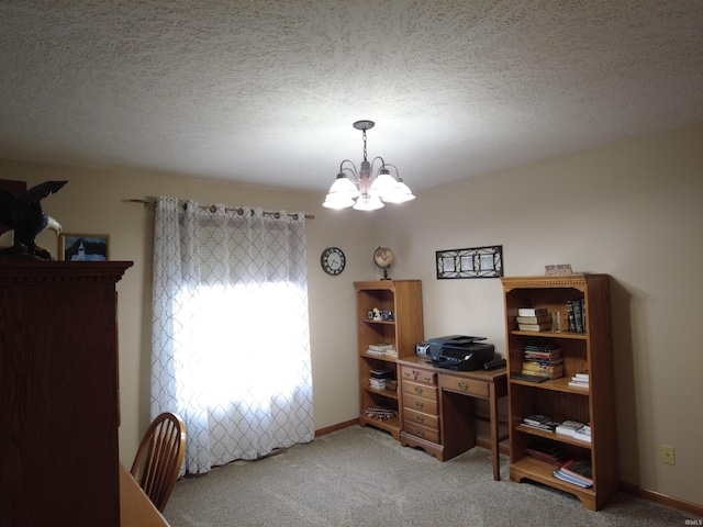 office space featuring carpet flooring, a textured ceiling, and an inviting chandelier