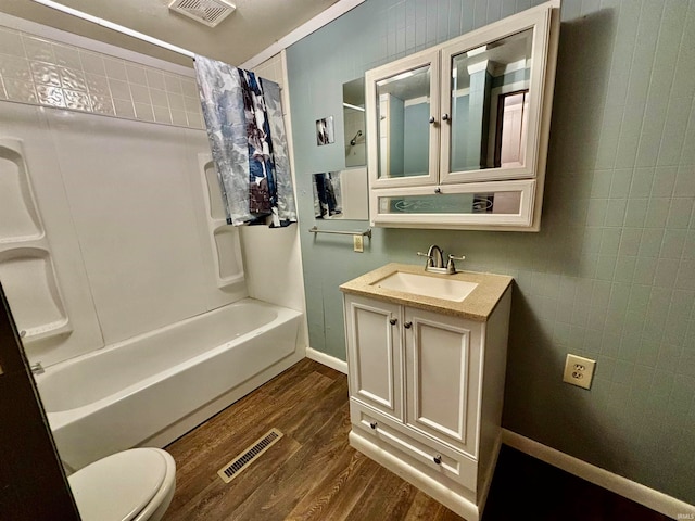 full bathroom featuring toilet, vanity, shower / bath combo, and hardwood / wood-style flooring