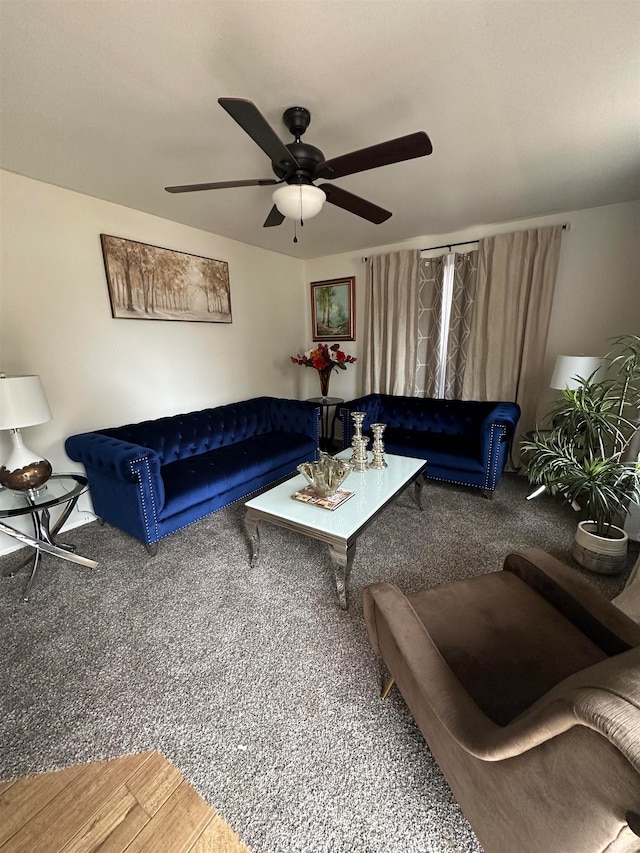 living room with hardwood / wood-style flooring and ceiling fan