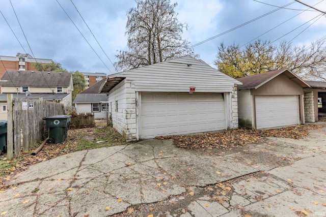 view of home's exterior with an outbuilding and a garage