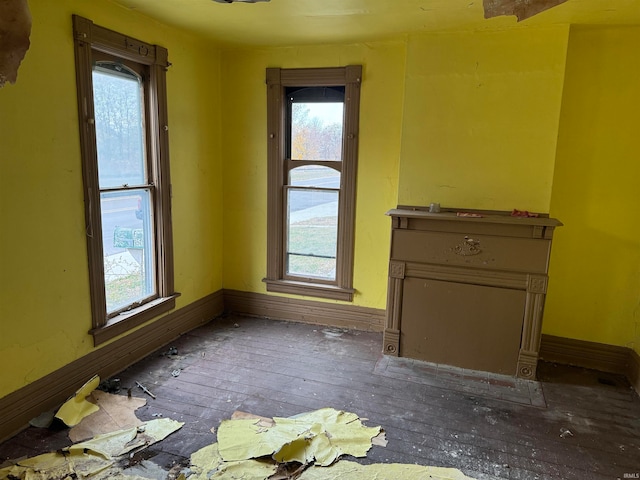 spare room featuring dark hardwood / wood-style flooring