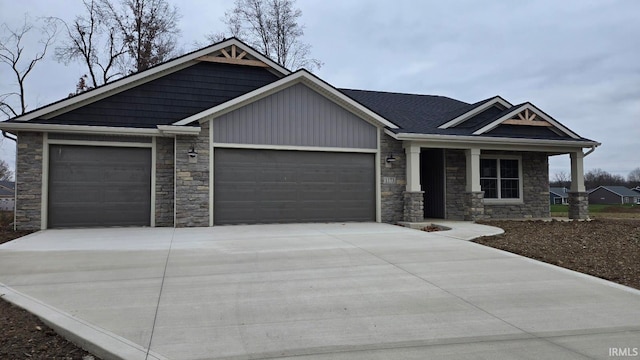 craftsman-style home with a garage