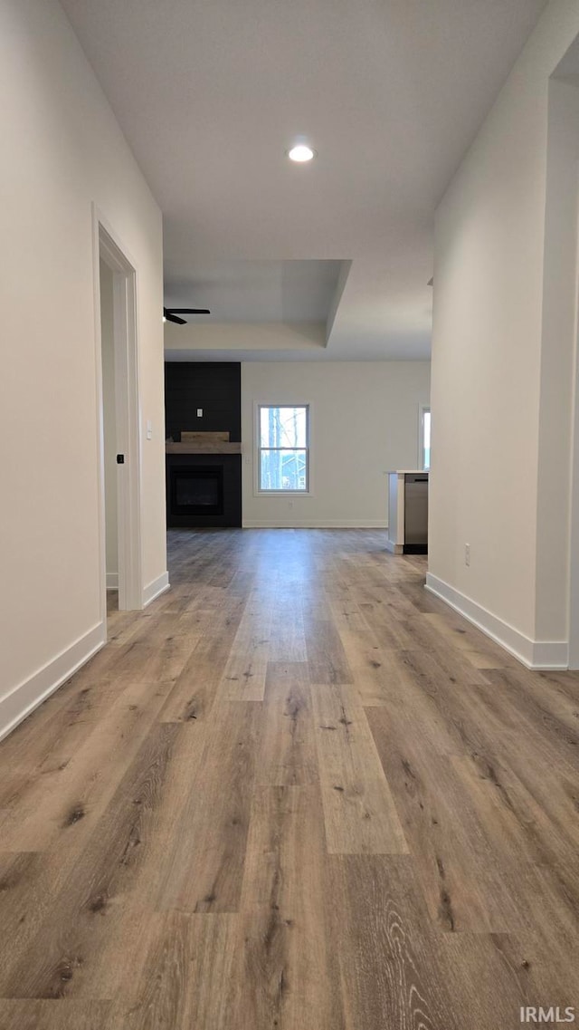 unfurnished living room with light hardwood / wood-style flooring