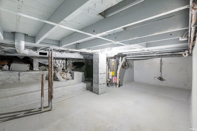 706 N Main St, Nappanee, IN 46550 - unfinished basement featuring water heater