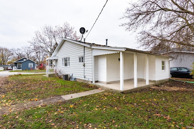 706 N Main St, Nappanee, IN 46550 - view of property exterior with a yard and cooling unit