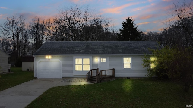 ranch-style home featuring a yard