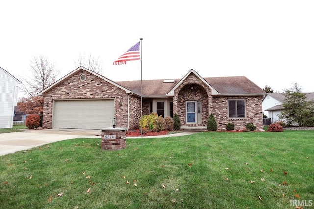 ranch-style house featuring a front lawn and a garage