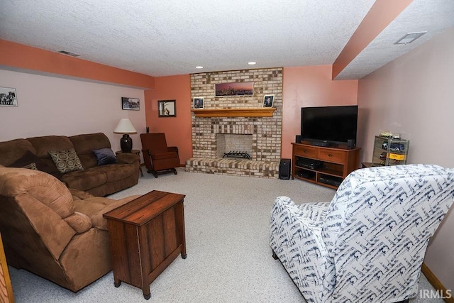 living room with a fireplace, a textured ceiling, and light colored carpet