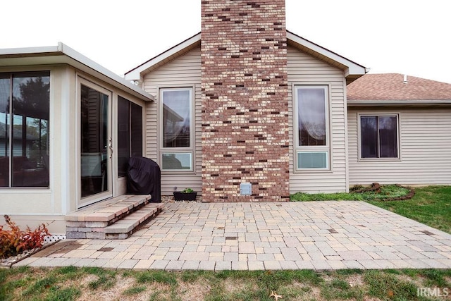 rear view of property with a patio