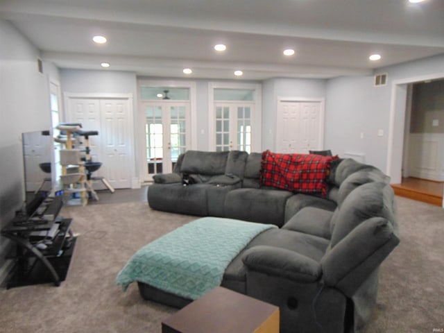 living room featuring carpet flooring and french doors