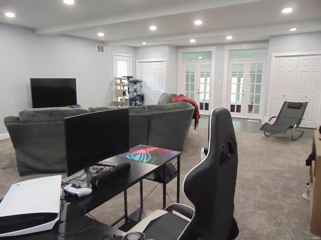 carpeted living room with french doors