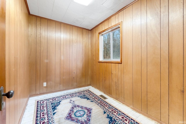 empty room with wood walls