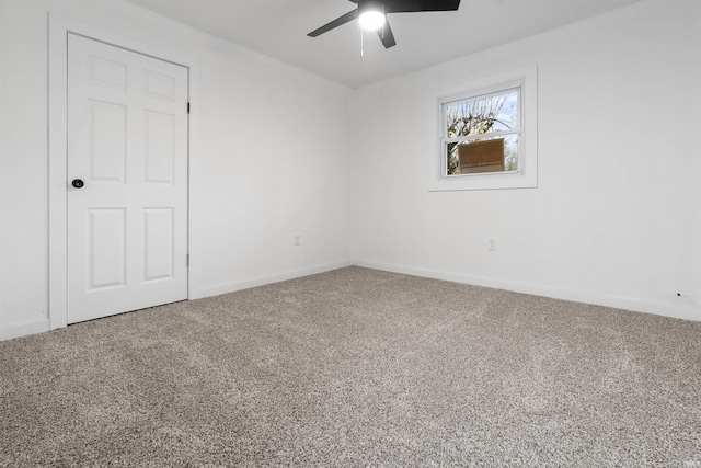 unfurnished room featuring carpet flooring and ceiling fan