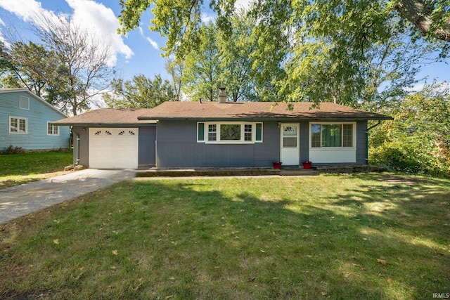 ranch-style house with a front yard and a garage