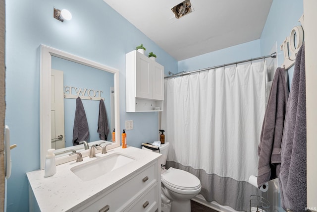 full bathroom featuring vanity, toilet, and shower / tub combo