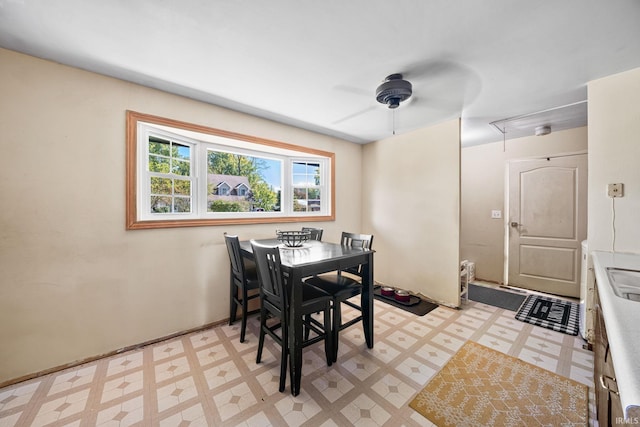 dining area with ceiling fan