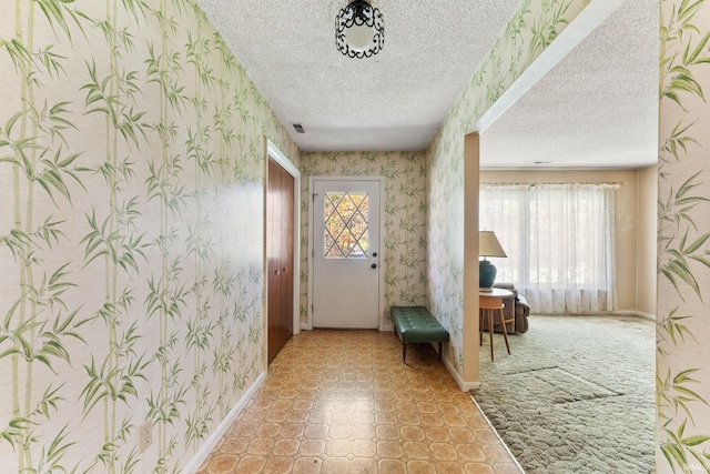 interior space featuring a textured ceiling